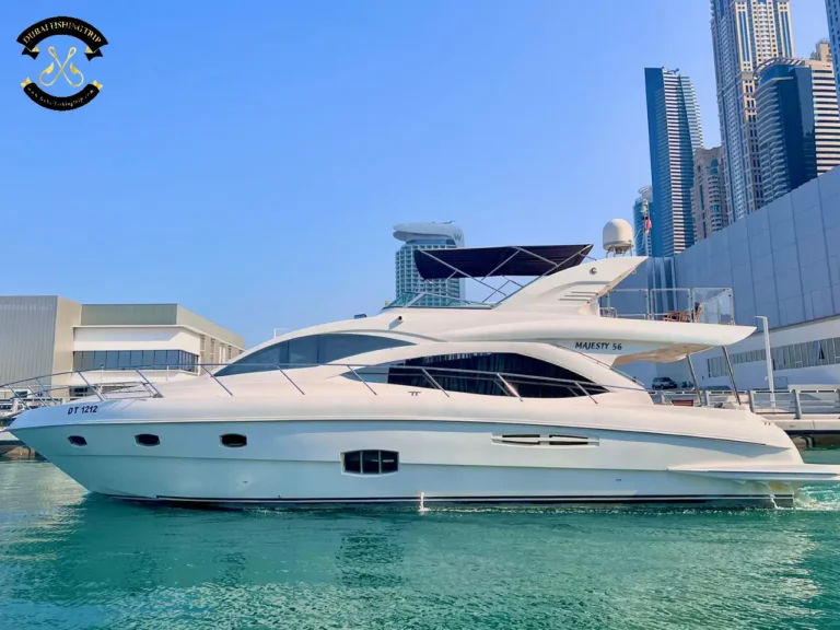 Dubai Fishing Trip. Elite 12 Majesty 56 FT full boat from the side.