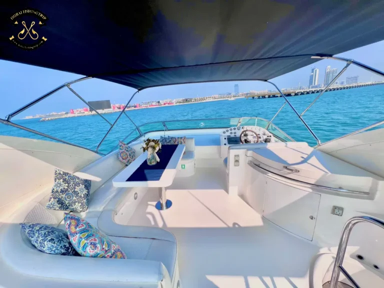 Dubai Fishing Trip. Elite 12 Majesty 56 FT upper deck with captain's seat.
