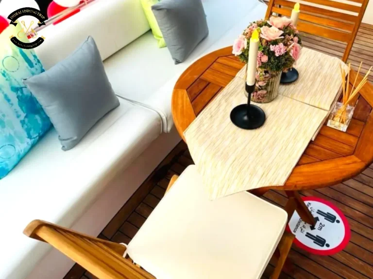 Dubai Fishing Trip. Elite 14 Majesty 44 FT chairs and tables outside of the boat.