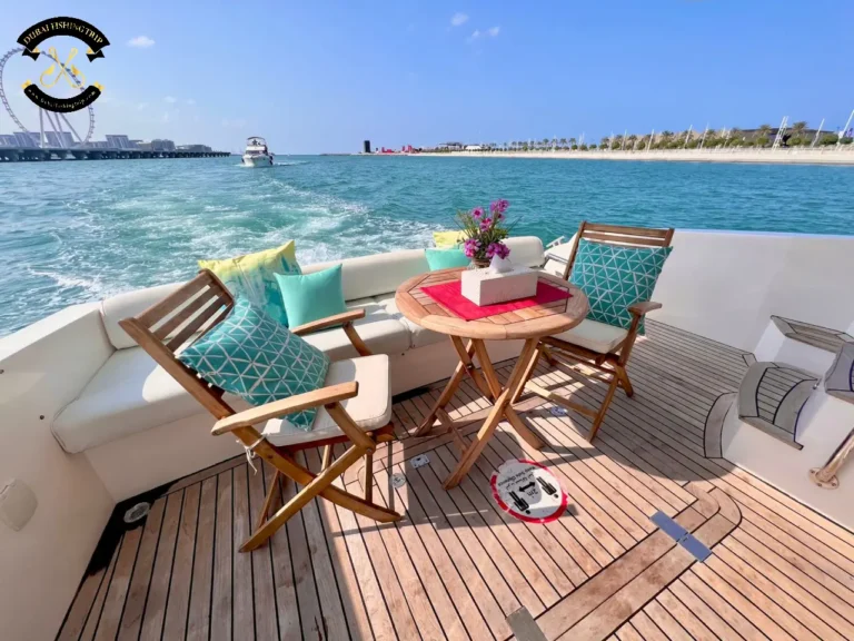Dubai Fishing Trip. Elite 14 Majesty 44 FT chairs and table behind the boat.